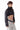 Chaqueta de cuero BLKMBA negra con corte corto y cuello alto ajustable.